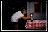 Desperate for a cooked marshmellow, Angi ruins the Coleman lantern.