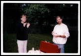 Anne prepares for another failed attempt at making a whistle out of a piece of bacon.